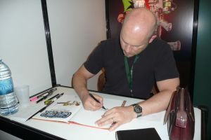 Midam signant l'album pour mon fils